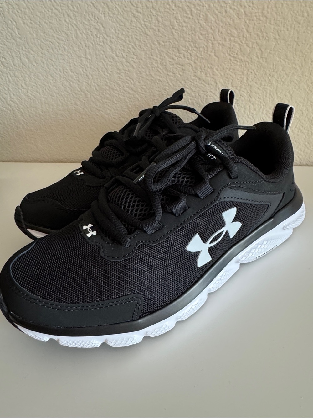 Under Armour Women’s Black and White Athletic Sneakers